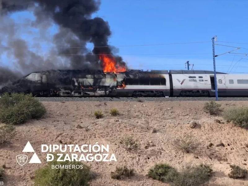 Train fire throws Madrid to Barcelona travel into chaos over holiday weekend